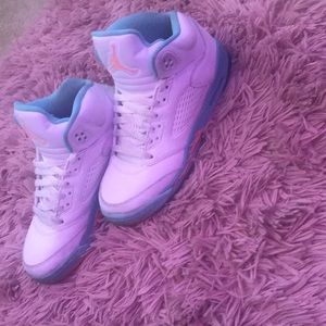 Teal and Orange colored Jordan 4’s